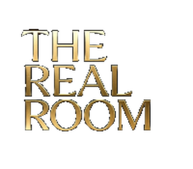 THE REAL ROOM wordmark — gold-on-black brand mark